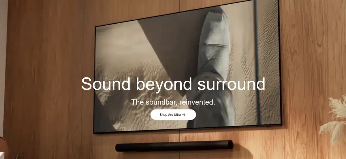 Sonos' website with a flat screen tv showing a shoe stepping on sand