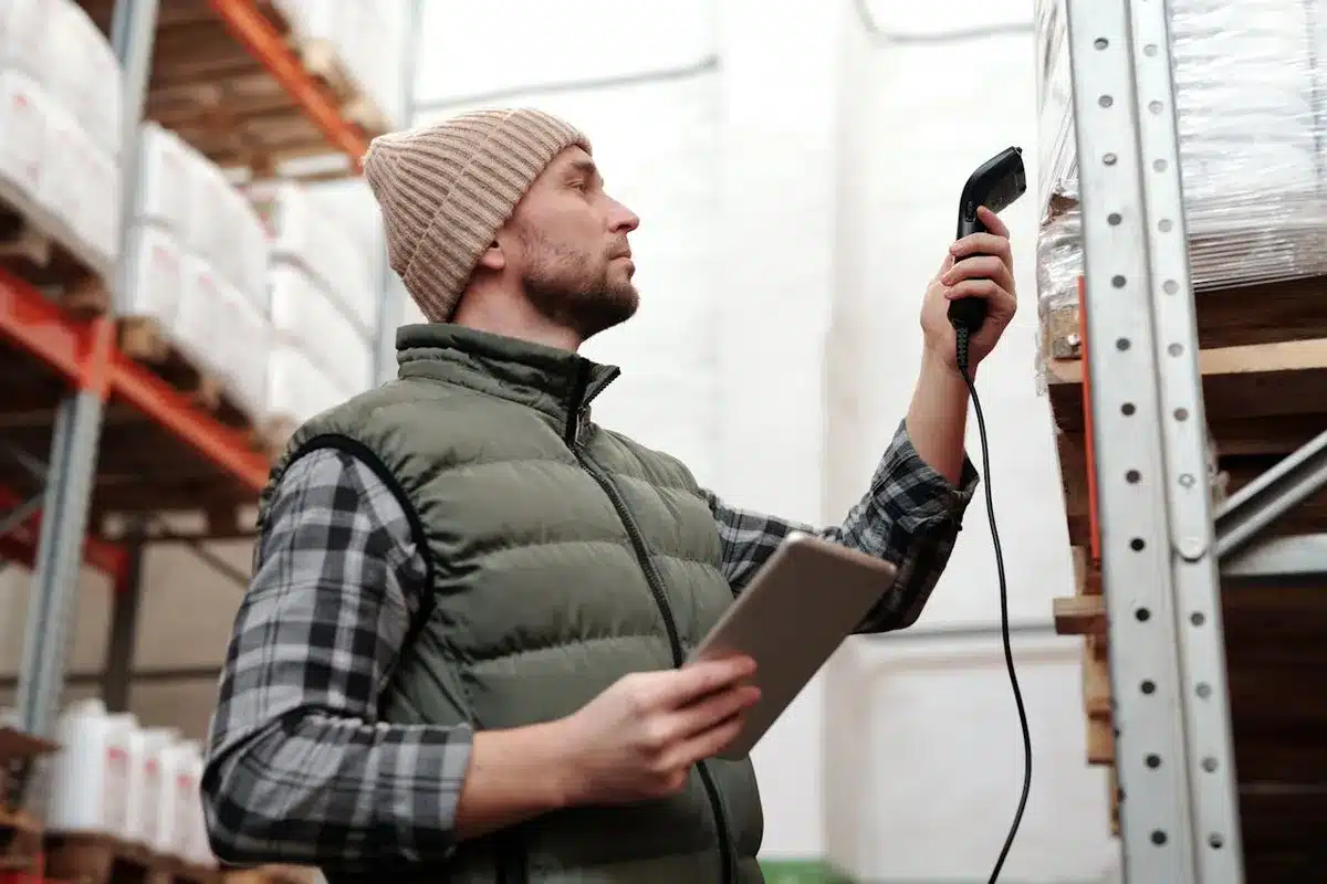Employee checking inventory for a product for a client