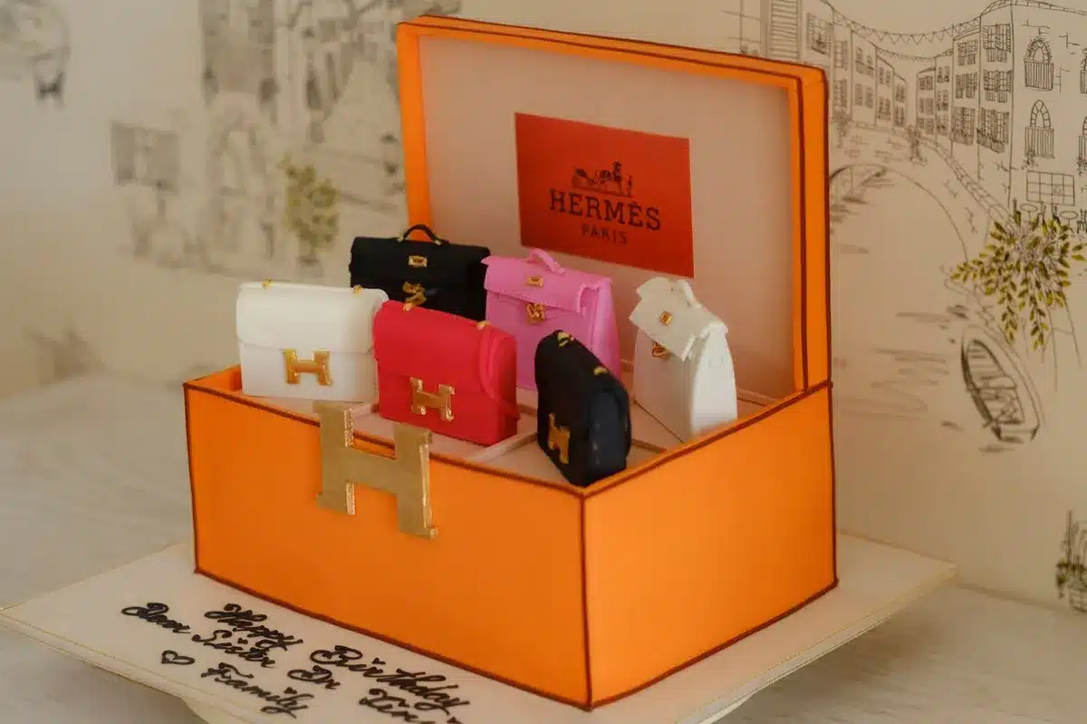 Hermes box with a couple of gifts of different colors inside