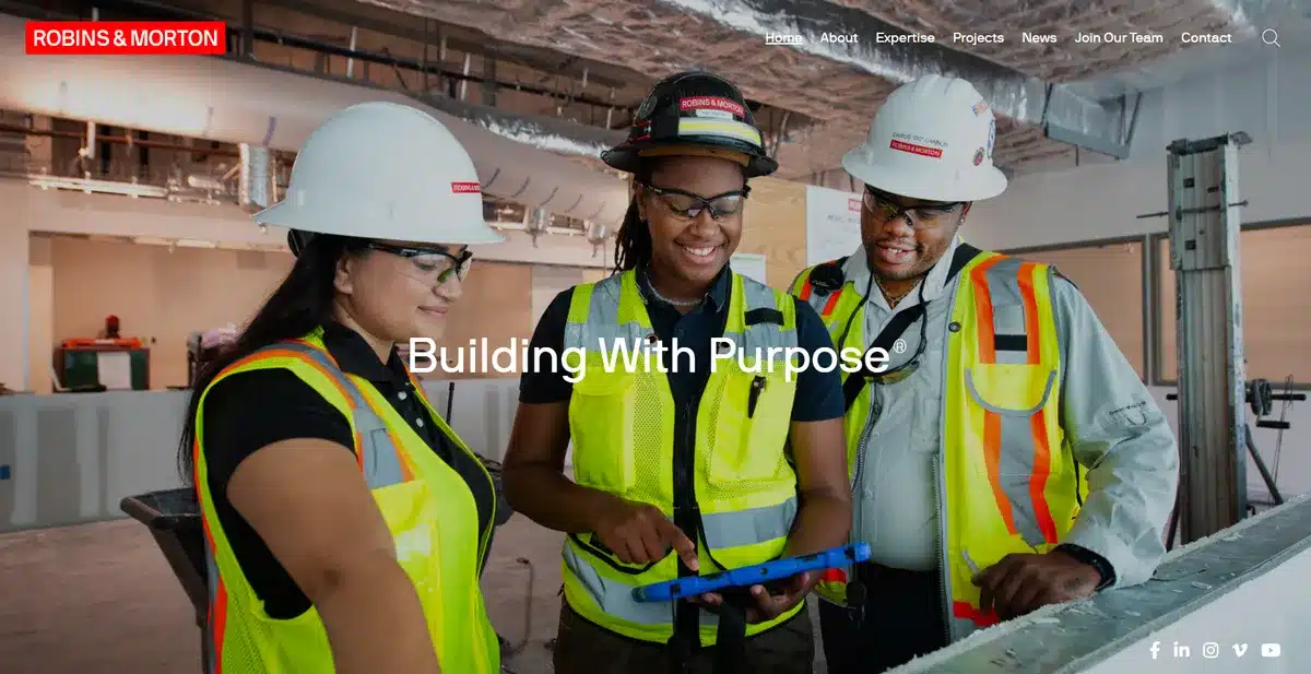 Robins and Morton website showing their employees working on a project as their main image