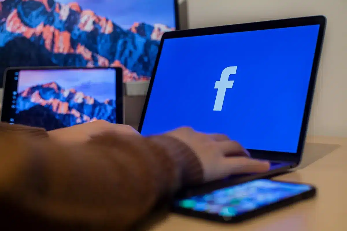 Facebook's Blue logo on a laptop screen