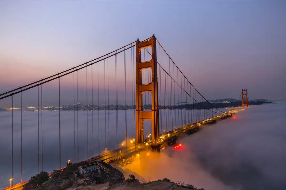 San Francisco bridge with fog beneath it